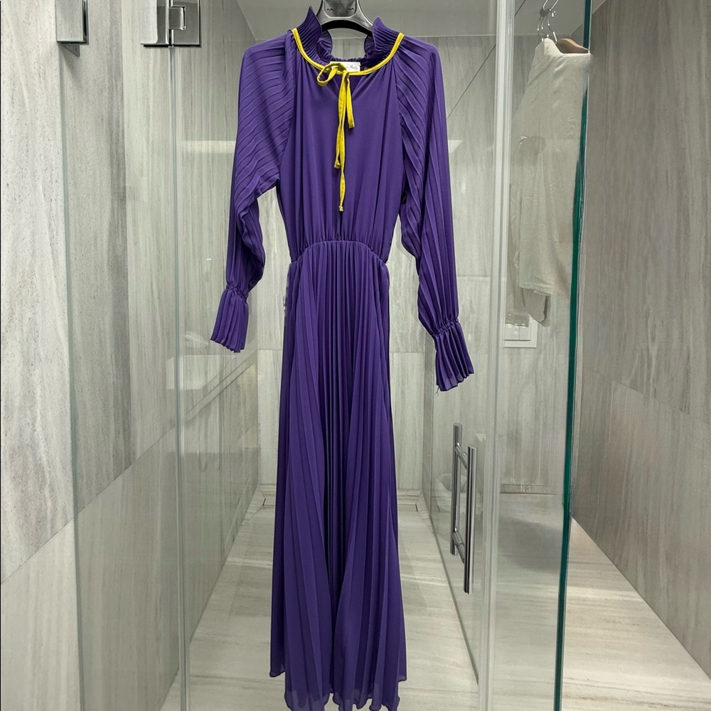 Purple pleated dress with green neck tie